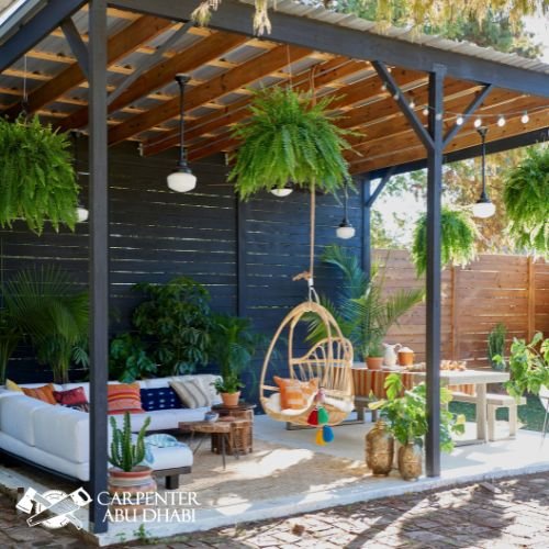 Outdoor patio, wooden pergola, hanging plants, swing chair, cozy seating, boho decor, greenery.
